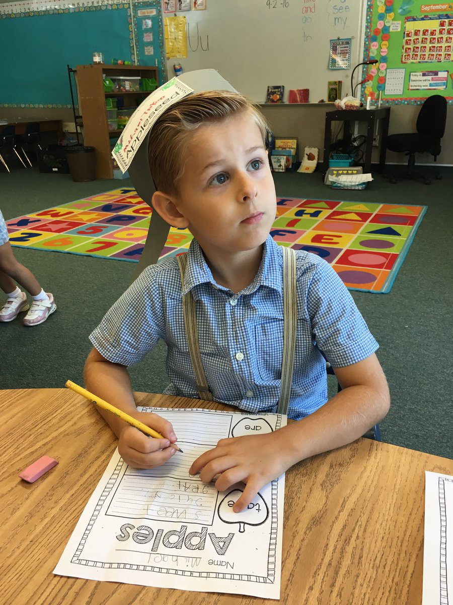 k1pandas's tweet image. Michael &quot;Appleseed&quot; dressed the part and working hard to write apple describing words. 🍎📝 #FSDela #FSDstuengage #acaciapandas