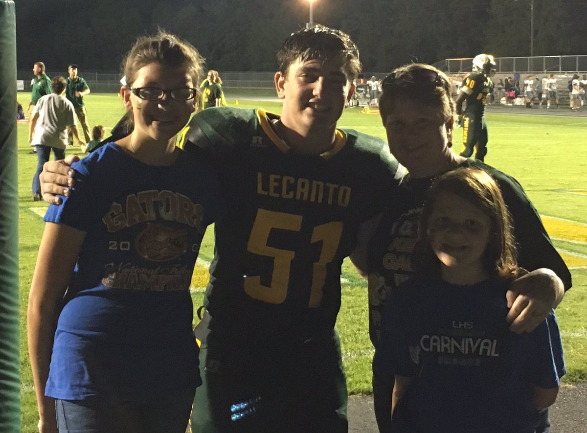 jennif93's tweet photo. Even after a hard loss, Panther families can make each other smile! Love our adopted player Brian @breedloven5161 💚💛 #LHSinnovates https://t.co/IVv6VrYer7
