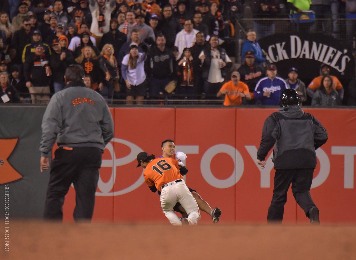 Angel Pagan takes down a fan who ran on the field during the Giants 9-3 win over the Dodgers Friday night