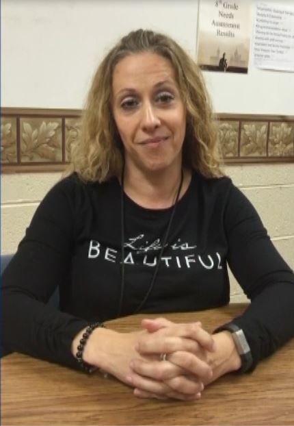 Tennessee teacher hailed as a hero for talking student into surrendering a loaded weapon.