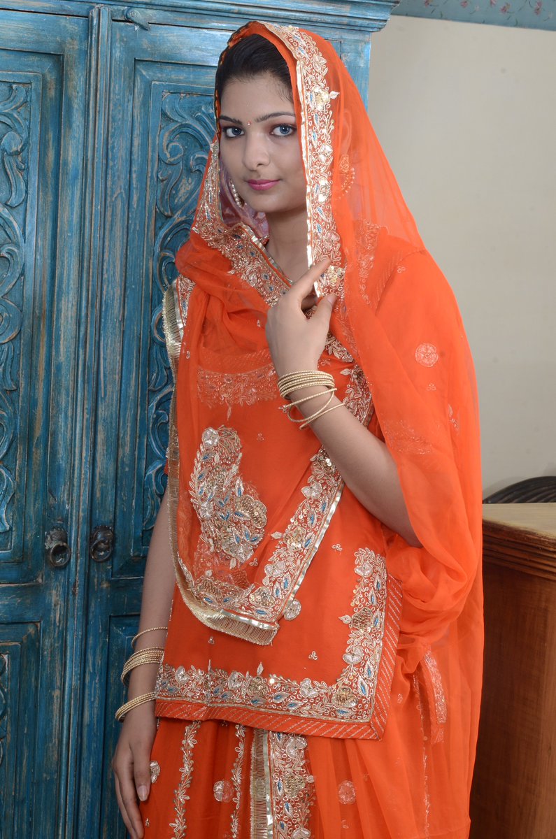 orange rajputi poshak