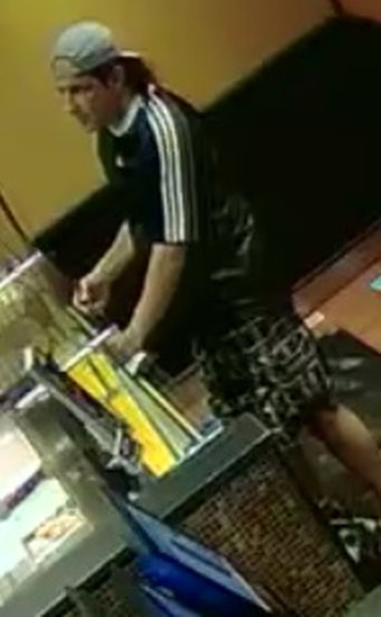 Police searching for a man posing as a delivery guy defrauding downtown business owners