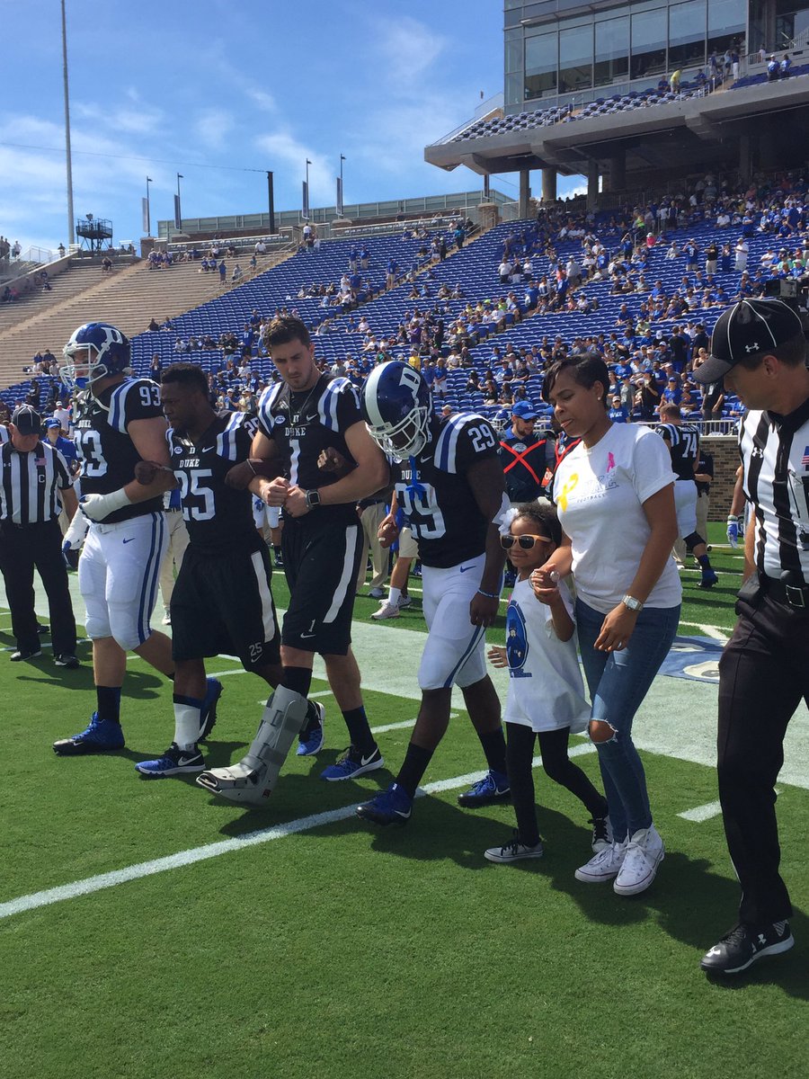 DukeATHLETICS's tweet image. Excited to have honorary captain Leah Still join us at Wallace Wade today as we fight childhood cancer! #GoDuke #UVAvsDUKE