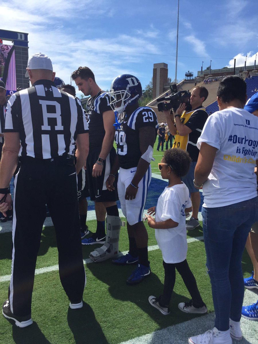 DukeATHLETICS's tweet image. Excited to have honorary captain Leah Still join us at Wallace Wade today as we fight childhood cancer! #GoDuke #UVAvsDUKE