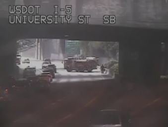 Crews responding to a reported brush fire on SB I 5 near the Convention Center in Seattle