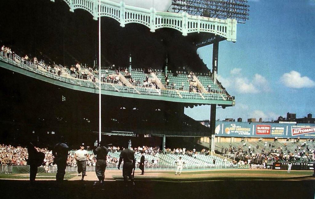 MLBcathedrals's tweet photo. Roger Maris crosses the plate at Yankees Stadium as he hits his record breaking 61st of the season, 55 years ago, today. #Yankees https://t.co/GqomZiLOct