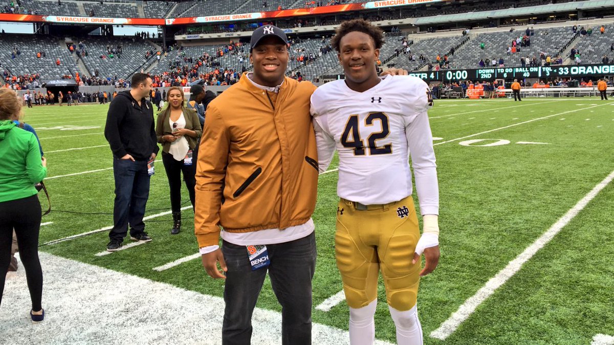 NDFootball's tweet photo. Irish alum and current NY Giants DL Romeo Okwara on the sidelines tonight to cheer on his brother, freshman DL Julian Okwara.

#NDFamily https://t.co/3WVvoqpBGs