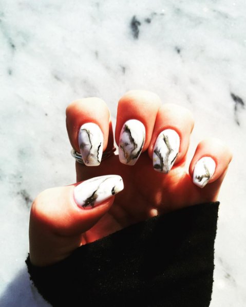 CDLcalgary's tweet photo. When your floors match your nails✨  #calcuttagold #nailgamestrong #allmarbleeverything #yyc #flooring #marble #grey https://t.co/616n6MvJit
