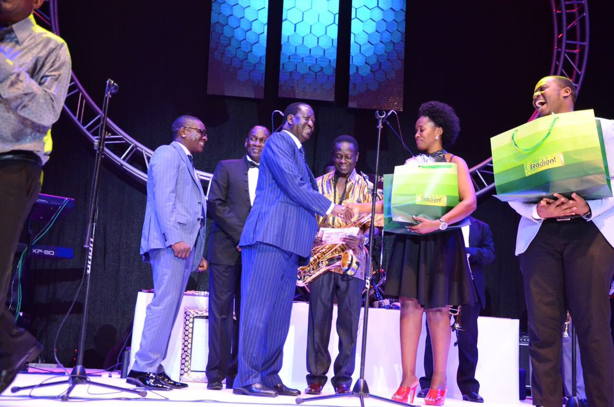 PembaSports's tweet photo. C.E.O Pemba Group of companies enjoys a light moment on stage with @mike_mukula and @RailaOdinga  at the Afrigo Band Concert https://t.co/VlTP0UCYzZ