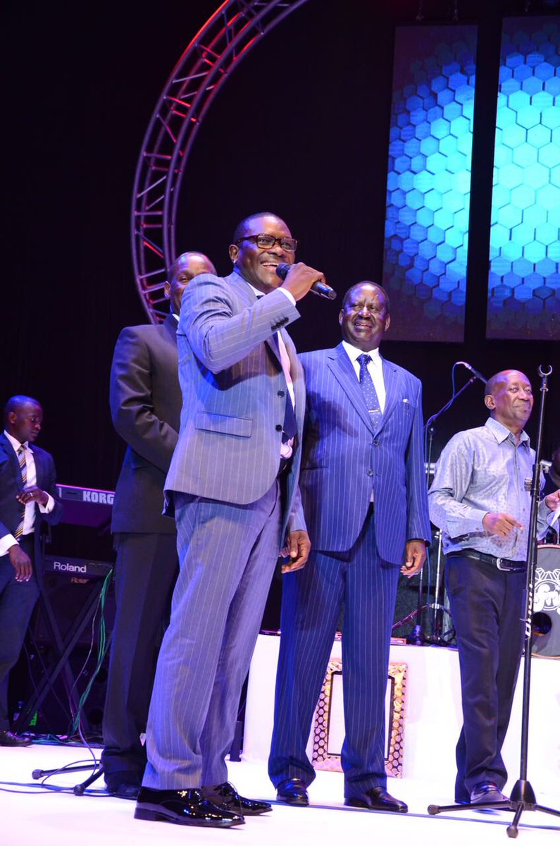 PembaSports's tweet photo. C.E.O Pemba Group of companies enjoys a light moment on stage with @mike_mukula and @RailaOdinga  at the Afrigo Band Concert https://t.co/VlTP0UCYzZ