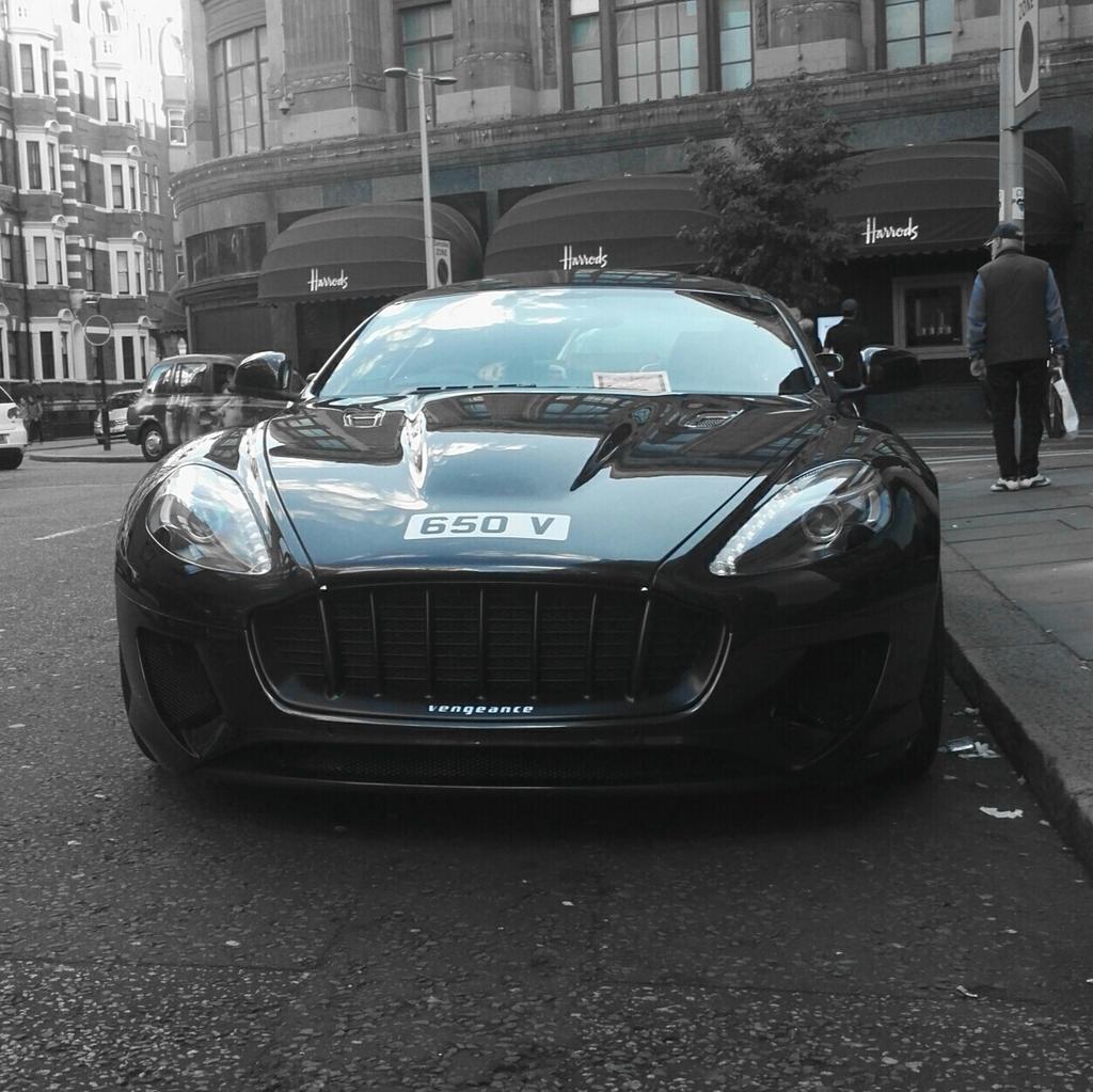CoolCarsLondon's tweet photo. Kahn Vengeance with a parking ticket (Aston Martin DB9) 
#kahn #vengeance #AM #AstonMartin #DB9 #liveupload #carspotter https://t.co/8rjcKez6mQ