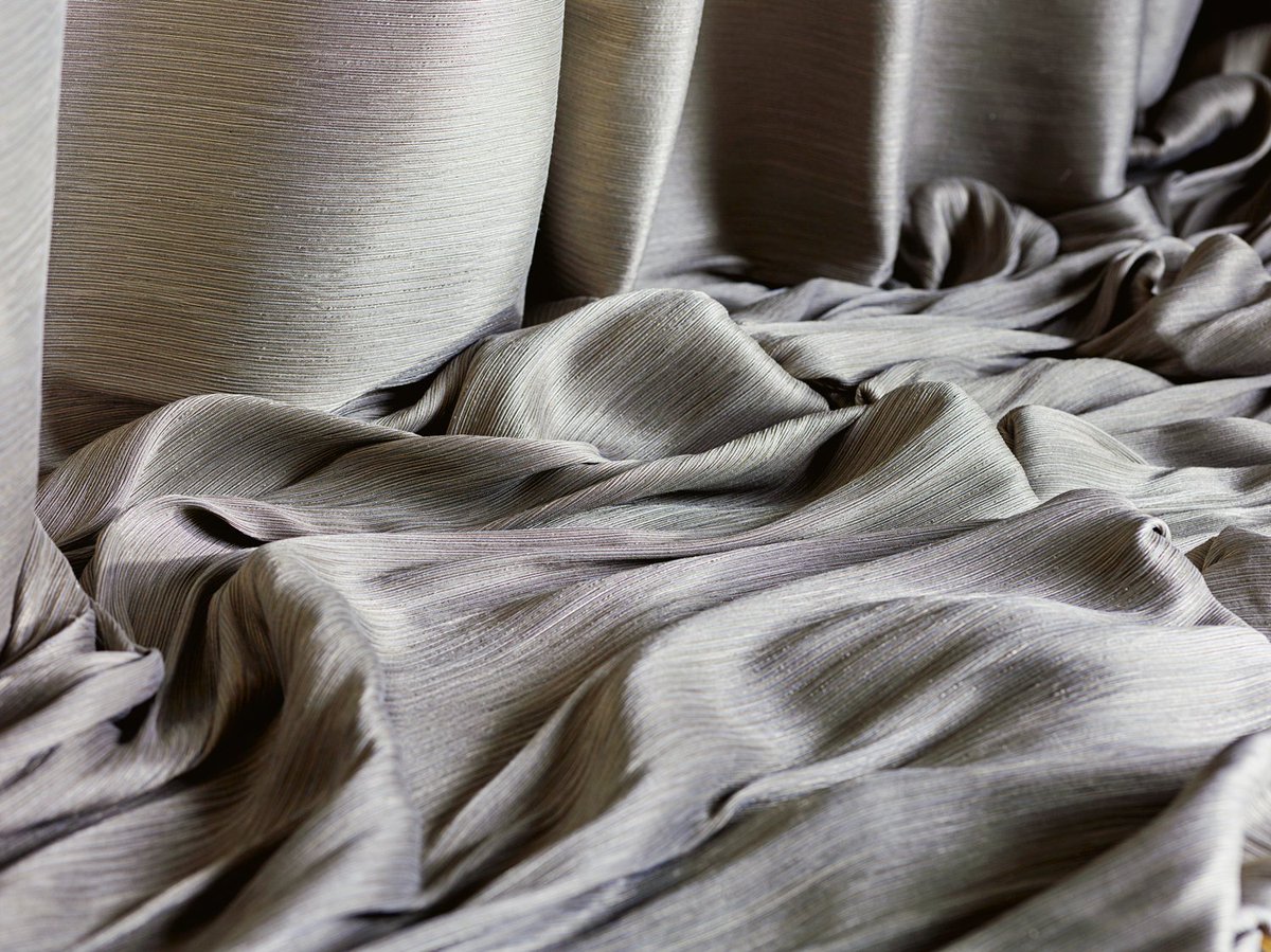 Our new 'Delphos' fabric has a smart horizontal weave and incorporates chunky metal effect yarns