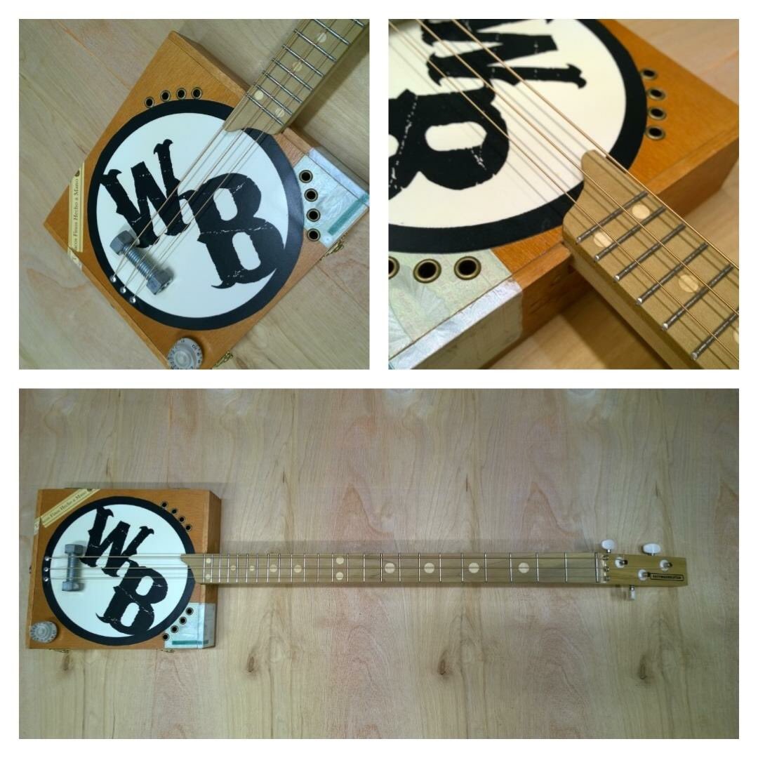 WailBoneTX's tweet photo. Custom cigar box guitar from @fatfingerguitar! Cheers Thom! 🍻 #wailbonetx #wailbone #fatfingerguitar #texasrock #southernrock #swampboogie https://t.co/EscF5B6FIp