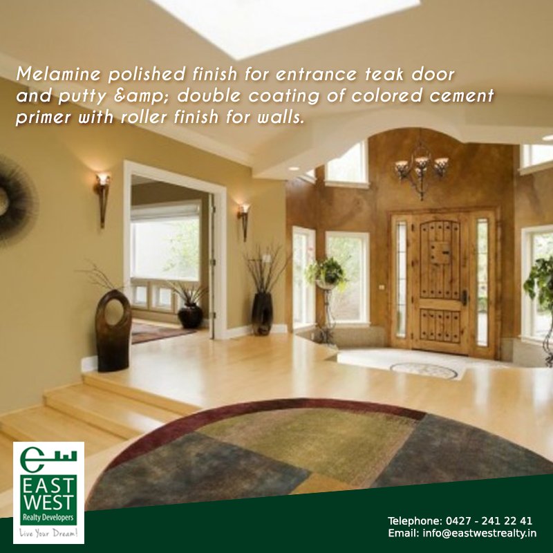 Melamine polished finish for entrance teak #door and putty &amp; double coating of colored #cement primer with roller finish for walls.