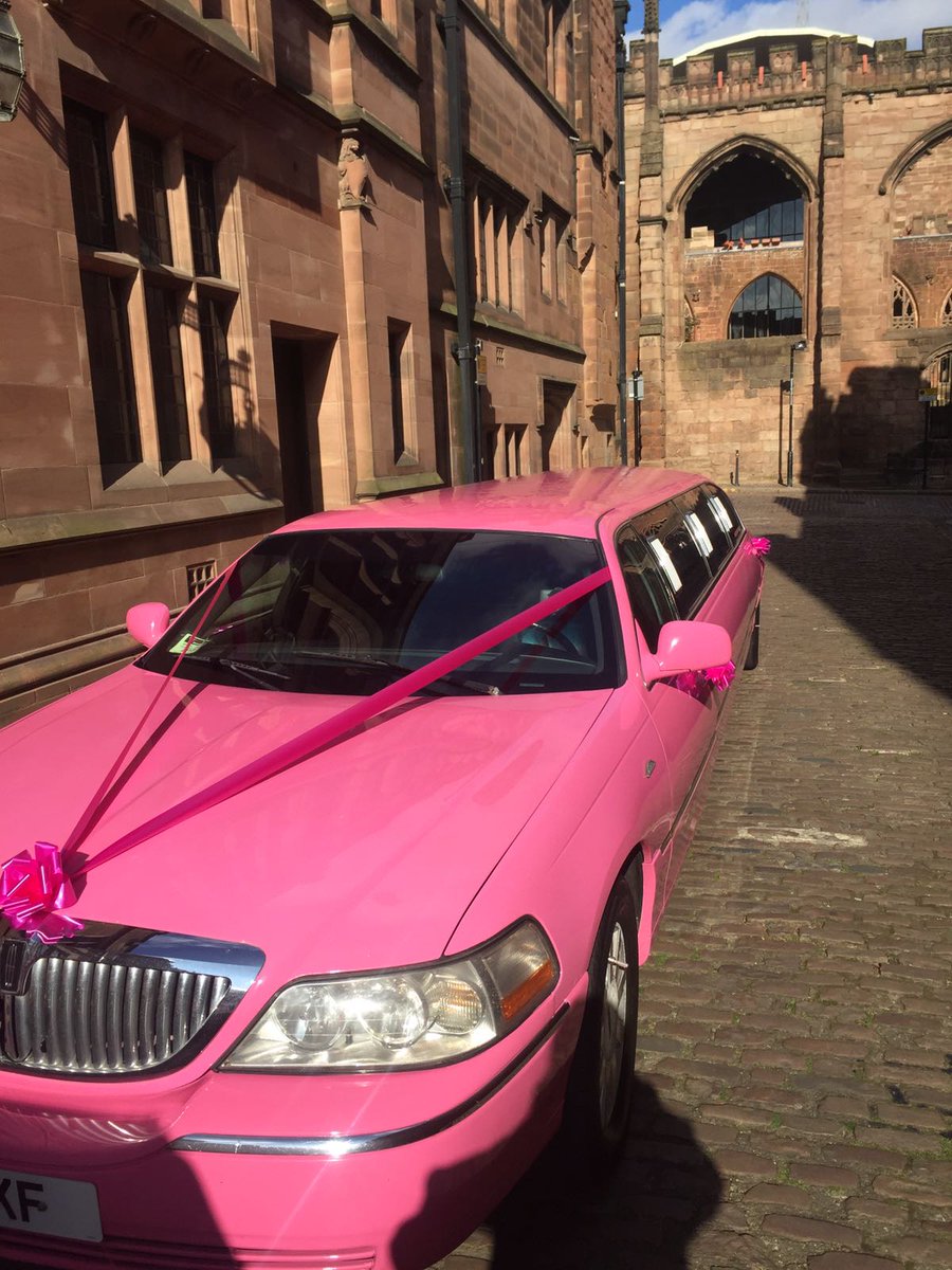 Our stunning pink limousine at a wedding, have you booked your Home James limousine?