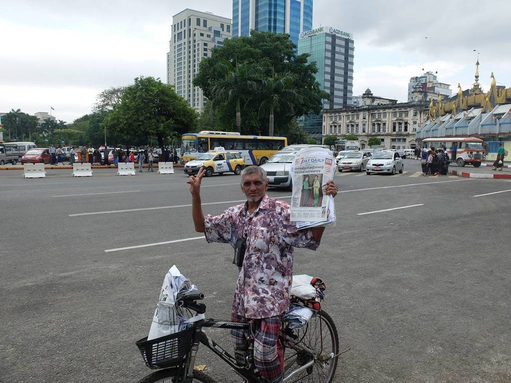 sayedulhuda's tweet photo. #Newspaper #Hawker outside #SulePagoda #Yangon #Myanmar January 2016 https://t.co/dfYVbD5K2m https://t.co/ikKe33e61v