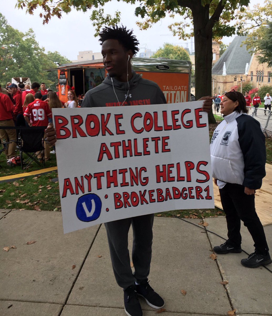 darrenrovell's tweet photo. Wisconsin basketball player @NIGEL_HAYES making big statement at College Gameday today with sign (H/T @BadgerBeat) https://t.co/esPl6HQNTi
