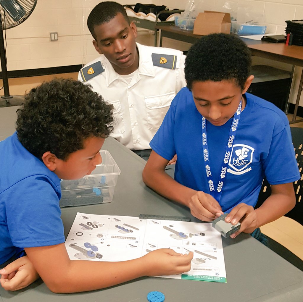 HOCMC's tweet photo. Some awesome @WestPoint_USMA cadets helping #HOCMC youth discover how fun #STEM can be. https://t.co/XXsOQfkMex