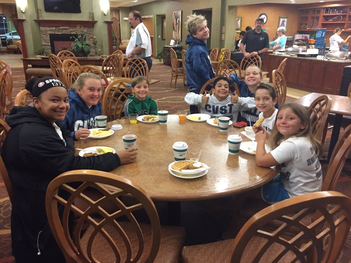CVSTSwimming's tweet photo. #CFM16 - The #CVST morning crew at the hotel breakfast before warm-ups today..., Wide Awake &amp; Ready To Go! #FunnestTeam #SwimUnited https://t.co/6UqJgPVwBC