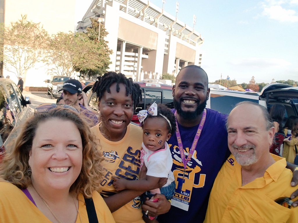 TigerBelleLee's tweet photo. Great day on campus. Tremaine and Ashley and it's baby Ava's first game. GEAUX TIGERS! #foreverlsu #ALLforLSU #GeauxTigers #RIPMikeVI https://t.co/F1oA7kqe5i