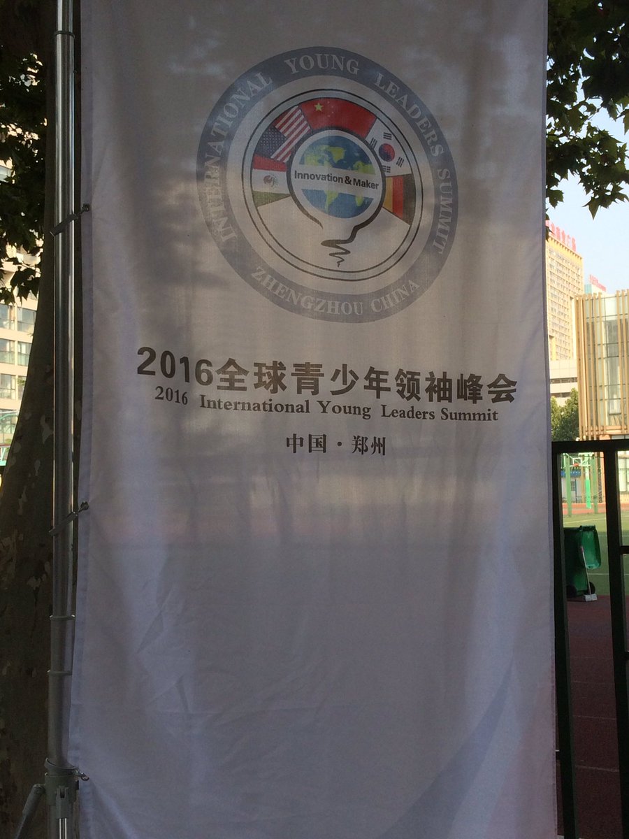 Kids are practicing the cha cha slide at the school.