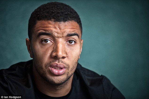 Troy Deeney looks like Drake's older brother who slings his own mixtapes to people in a Tesco Express.