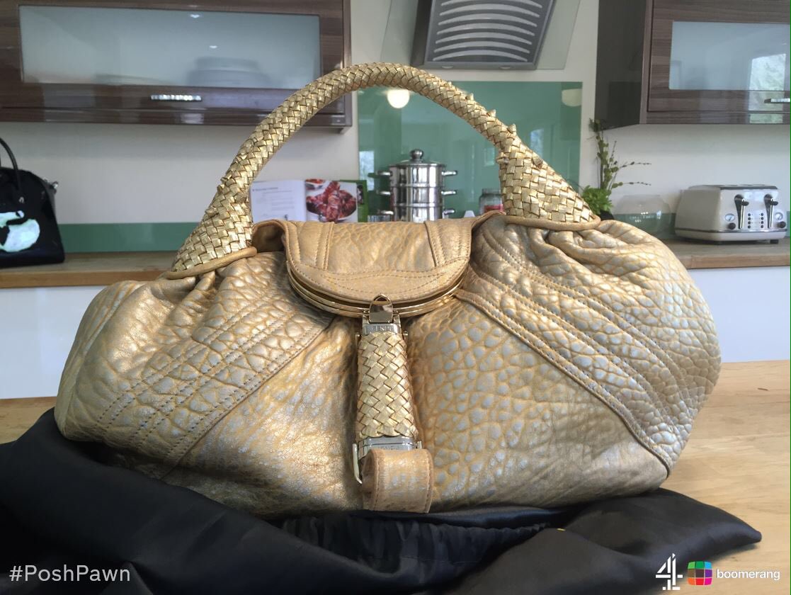 A limited edition gold Fendi Spy once owned by <a href="/MrsSOsbourne/">Sharon Osbourne</a>  What do you think of it? #PoshPawn