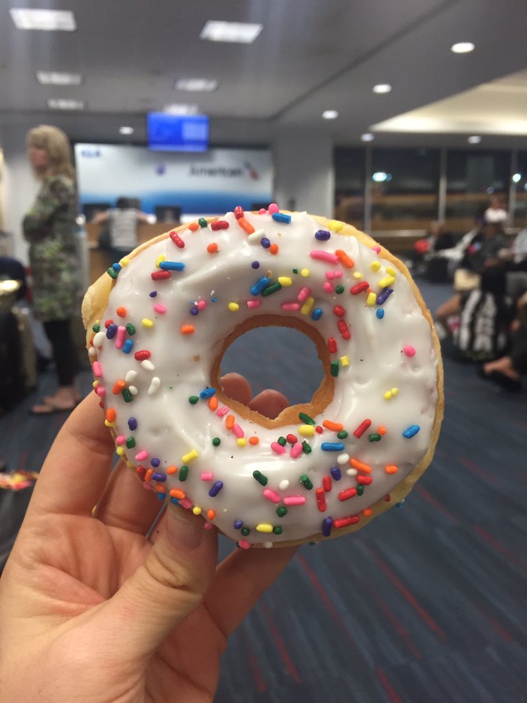 Forced to buy donut Bc flight delayed. <a href="/AmericanAir/">americanair</a> plz compensate us with more donuts 🍩