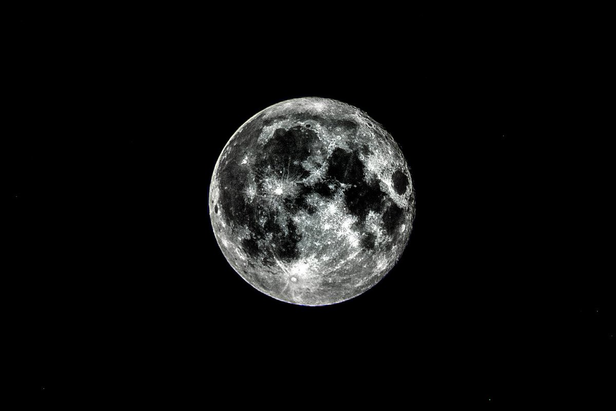 JimHoulbrook's tweet photo. Popped out to the garden and did a couple of moon shots with a view to a slightly different editing style. 
Lots of detail, but very dark. https://t.co/eoVXjzM0mY