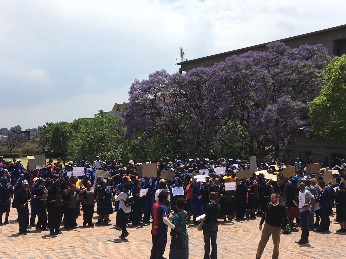 beccapotterton's tweet photo. @thedailyvox wits workers standing in solidarity with students saying remove the security https://t.co/jZVyhlZYUA