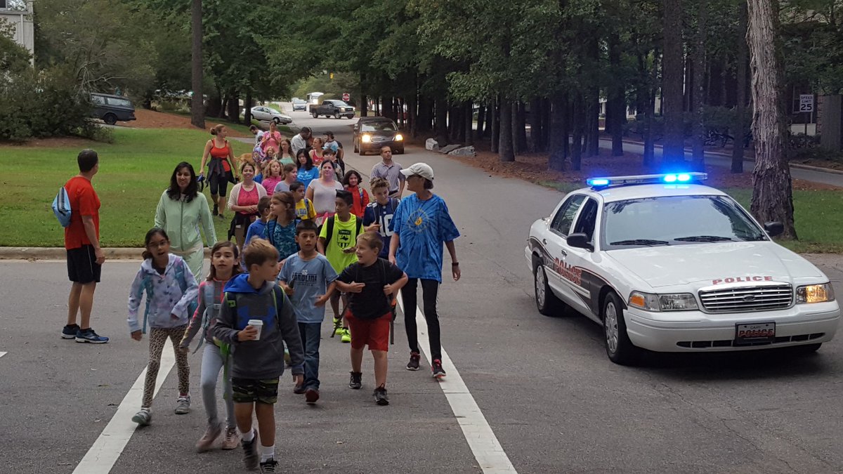 AHadsell's tweet photo. Great group for International Walk to School Day with @FWESIBPYP Thanks @TownofCary Police for escort! https://t.co/nRcCRMuMCE