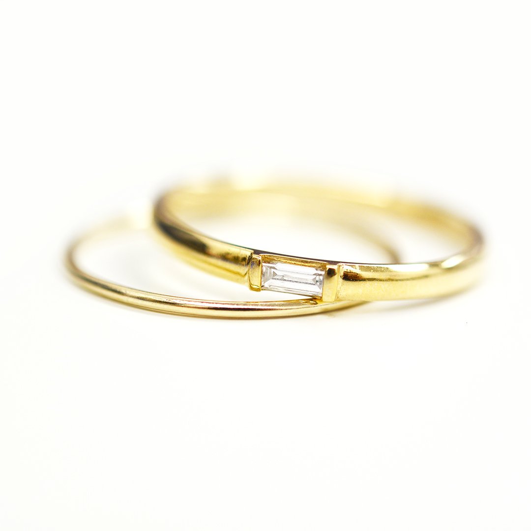 agildedleaf's tweet photo. Modest and petite baguette diamond ring with a super skinny gold ring #stack #lovegoldlive #ringsofinstagram #agildedleaf https://t.co/adpACinCrk