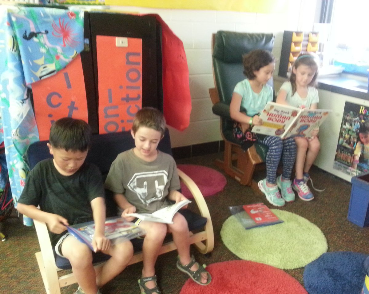 HeronFirsties's tweet photo. Reading fun with our fourth grade buddies from Ms. McNutt's class. @a2Thurston @4thThurston https://t.co/e2J0ex79Hc