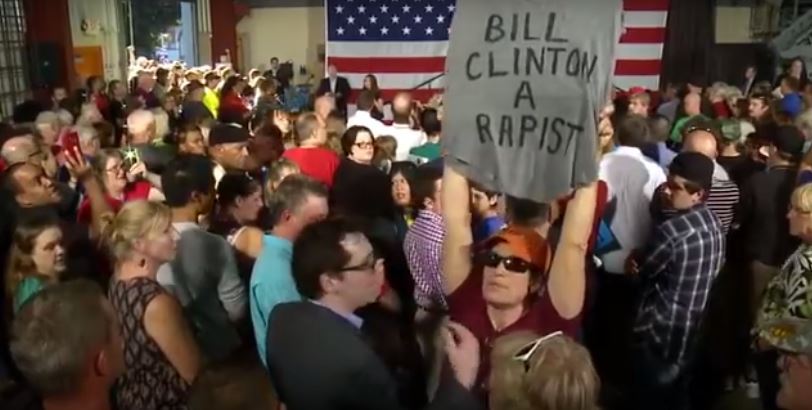 Bill Clinton is a rapist protester rattle small BJ and small crowd