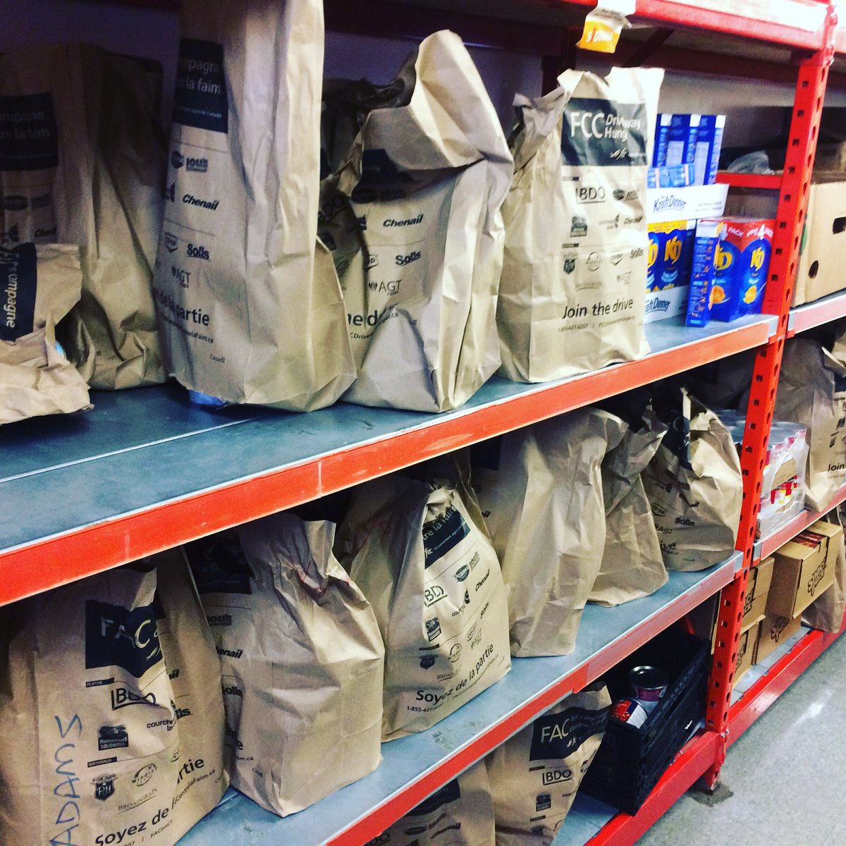 VinniesPtbo's tweet photo. Grateful for the generosity of #FarmCreditLindsay &amp; the students of @HolyCrossPTBO! Our shelves at the pantry are filled! Thank you! https://t.co/GF45xcPE59