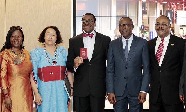 choi_afdb's tweet photo. #AfDB President Akinwumi Adesina receives African Passport, symbol of continental integration https://t.co/NxARDqrFaI #Africa #VisaOpenness https://t.co/nu014Qo2sm