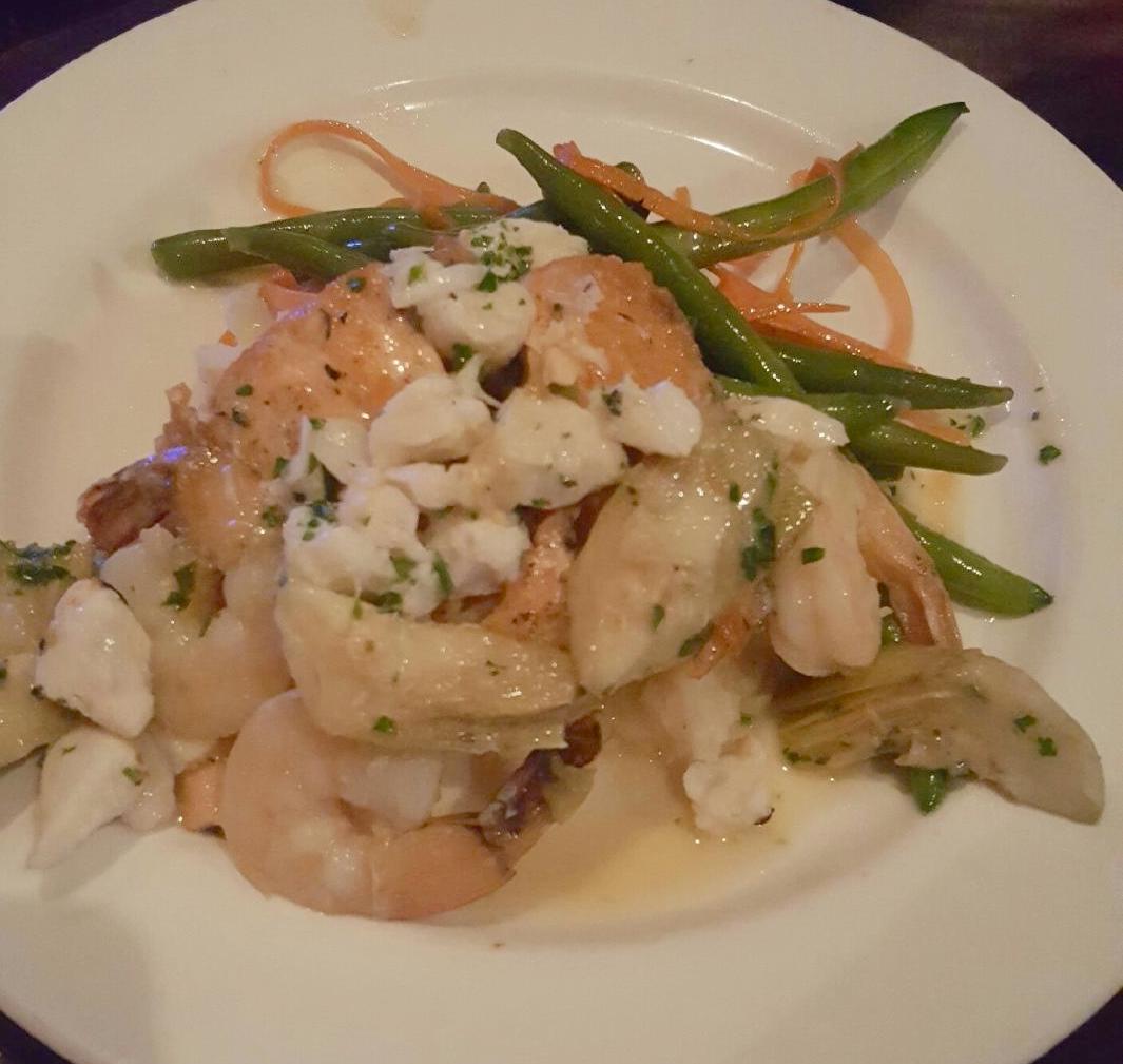 CorkRestaurant's tweet photo. Herb breaded salmon topped with Shrimp, Crab, Artichoke and Meyer Lemon Butter Sauce. Stop in to Cork for dinner this week. https://t.co/6yW8UsaMYv