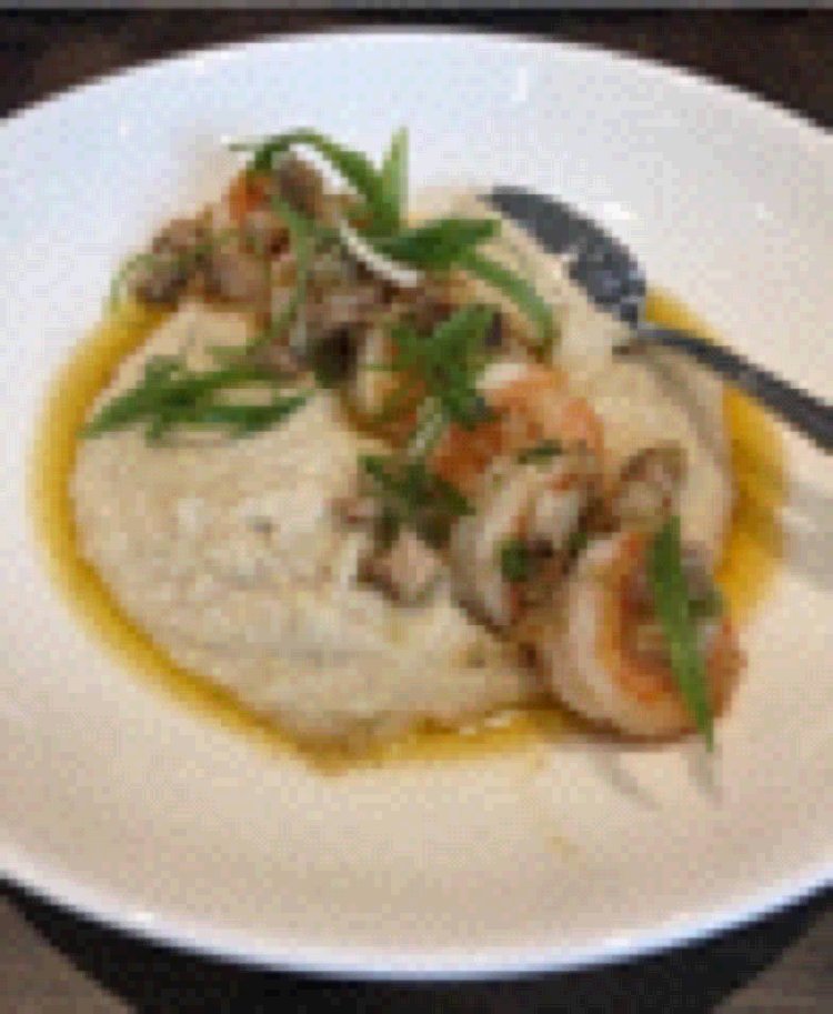 Shrimps meets grits meets magic. Available at both locations! 📷 by Karen M.