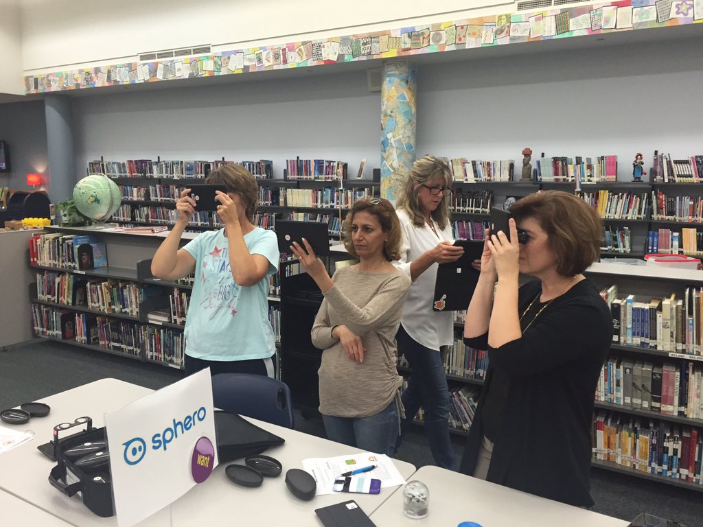 Cmaxwell1Craig's tweet photo. Parents getting to play with new technology #SWMLibrary https://t.co/mYUUh87RpO