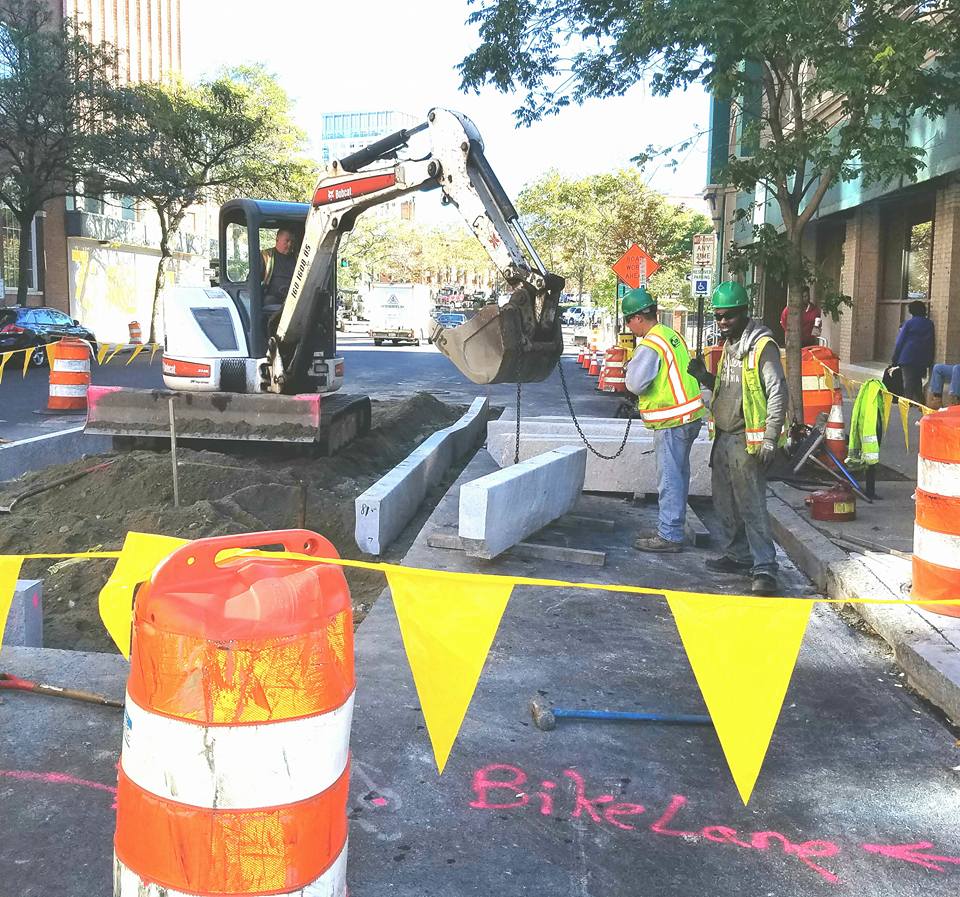 CardiCorp's tweet photo. Working for @Mayorpvdri . Laborers are installing new bus stop &amp; bike lane on Fountain St. Weather permitting, paving on Tuesday! https://t.co/hejyBgxdoH