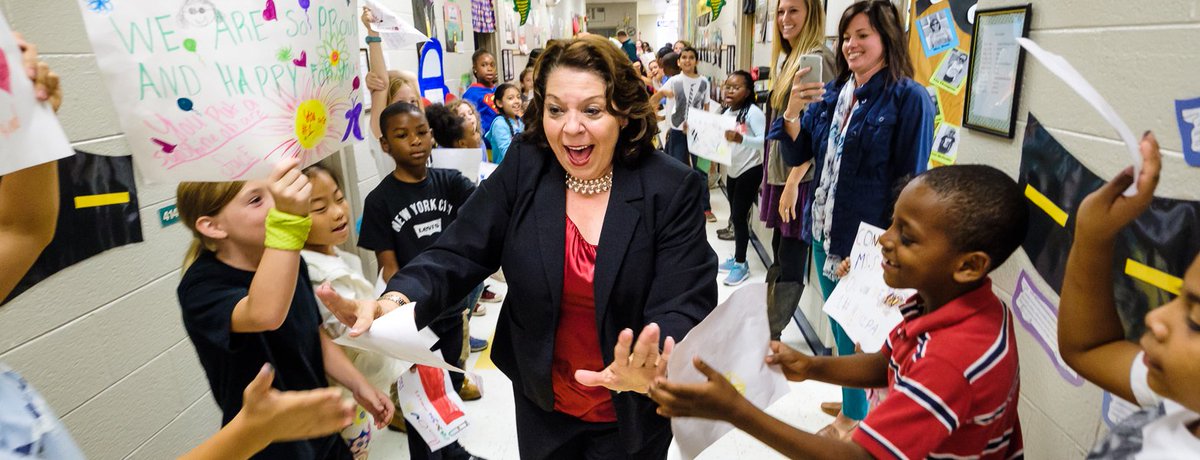 WCPSS's tweet photo. When 1,000 elementary school students hear they've got the district's top principal 🎉❤️🎈😃🎵 https://t.co/RxiM3ERMYx @CombsCatchUp https://t.co/r31l9U5flE