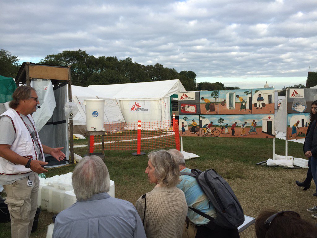 sean_p_burke's tweet photo. @MSF #ForcedFromHome juxtaposes #refugeecrisis against Capitol dome backdrop #aidrefugees #refugeeswelcome https://t.co/3tx9en08ne