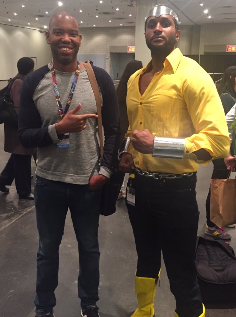 elmcitytree's tweet photo. My boy @tanehisicoates meets Power Man aka @EpimetheusCos My fave image of the 1st day of #NYCC https://t.co/QhV067WGye