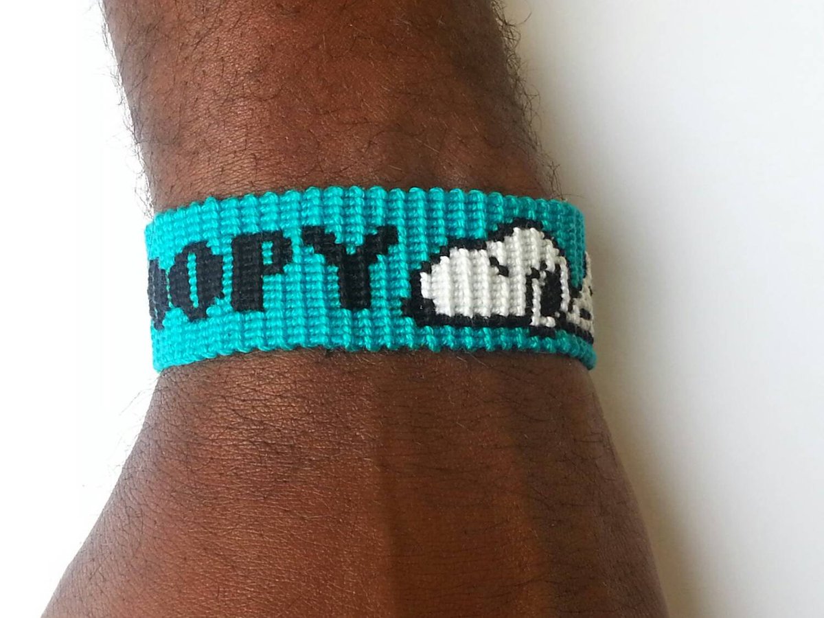 JahSans's tweet photo. Snoopy friendship bracelet. https://t.co/zU7NEopx7J #Etsy #KnottedBracelets https://t.co/XsO2hIgy4w