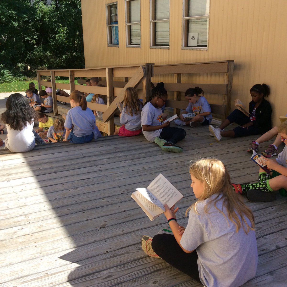 When it's 80 degrees and sunny in October, we read and have snack on the deck!☀️☀️☀️ #harrispride