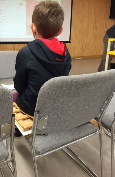 RoyalBCMuseum's tweet photo. A student helps with #plant presssing at #ToadRiver Elementary after a talk by Dr. Hebda, Curator of Botany https://t.co/FWVKxdeyFn https://t.co/0XtmLzUW46