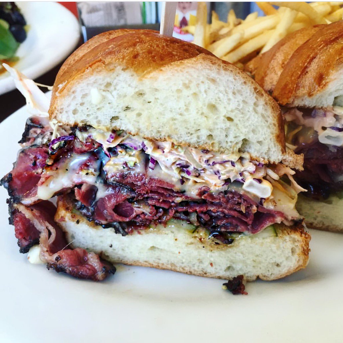 Eat_Chow's tweet photo. Our diners describe our Reuben as "Heaven on Earth". It must have something to do with our smokey housemade corned beef and melting Swiss https://t.co/gvlIgY0Tvp
