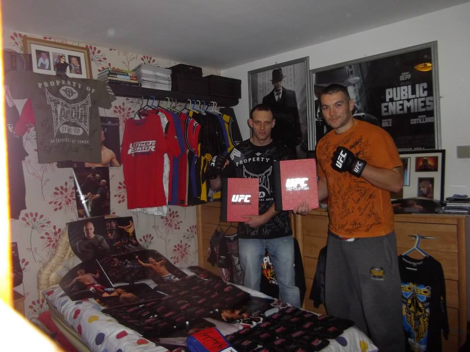 BigCheeseLogan's tweet photo. About a quarter of mine and @deanmonks2 collection too much to pull out @One_Punch @danhardymma #tufcollection #ufccollection https://t.co/1IfHSovHOD