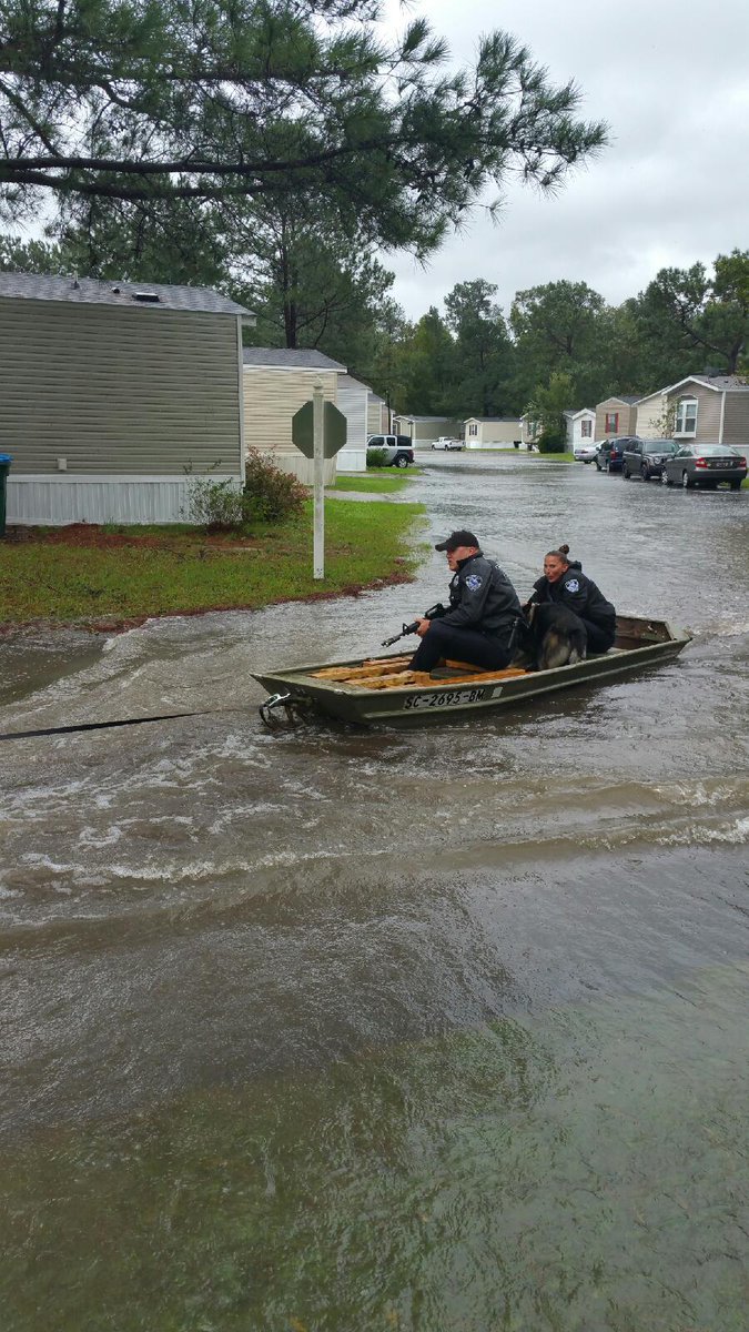 SPDSC's tweet image. PFCs. Bazzle, Burke &amp;amp; her K-9 partner, APART respond to a call via boat today. We R always on the job, rain, shine or high water! #protectU