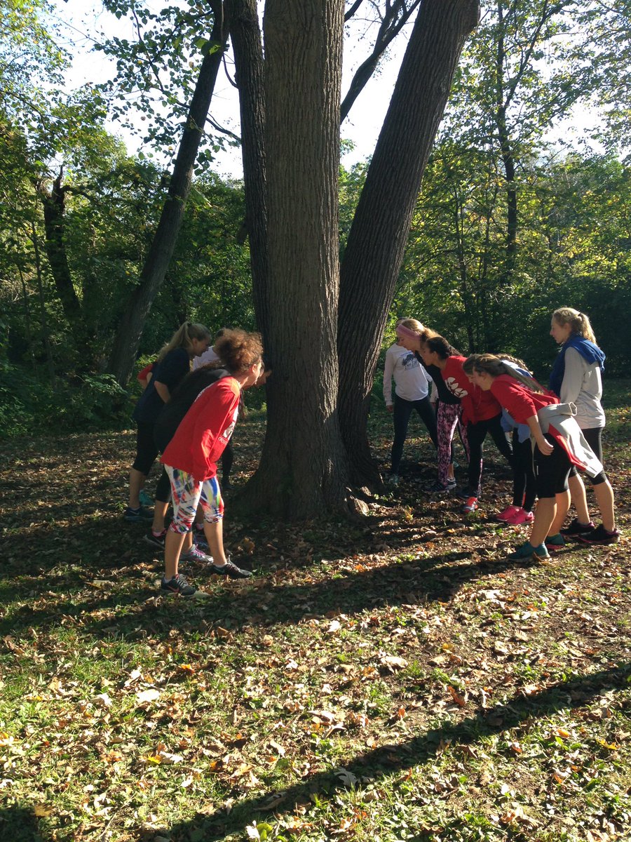 NCHSTrackXC's tweet photo. The tradition of spitting on the tree lives on. Last workout for the seniors at Lincoln Park. https://t.co/idFFl93cE0